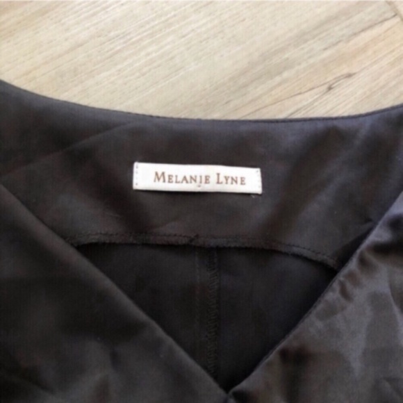 Black Ruched Asymmetrical Sleeveless Blouse - Picture 4 of 6